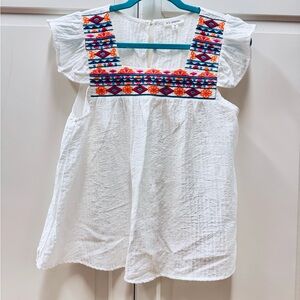 White Puckered Cotton Top with Cap Sleeves and Colorful Embroidered Trim